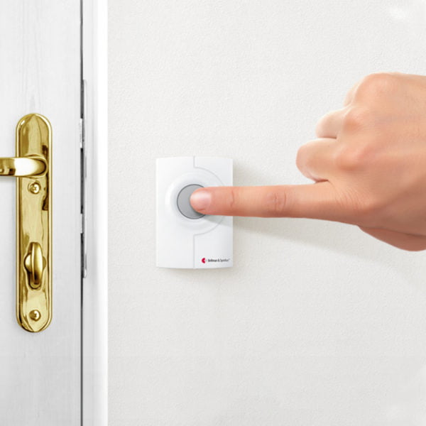 Pushbutton Door bell being pushed
