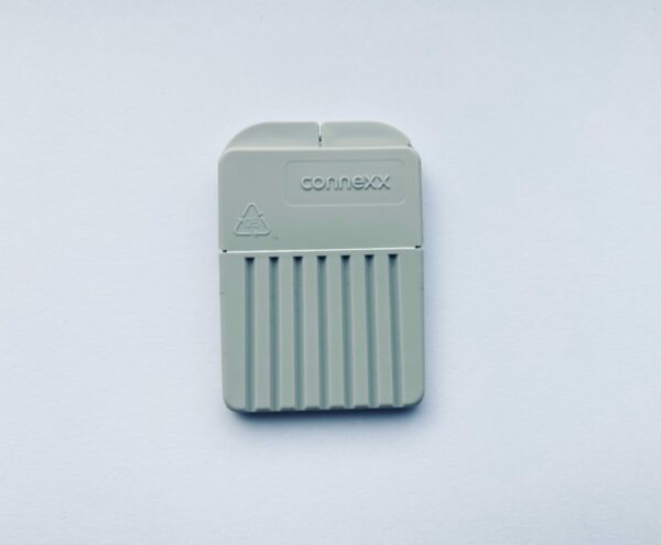 Photo of grey new unopened connexx waxtrap on white background